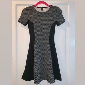 Black and gray, form fitting dress